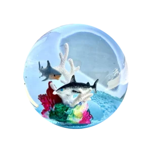 An image of the ocean squishy Kiedle stress ball with sharks over a transparent background