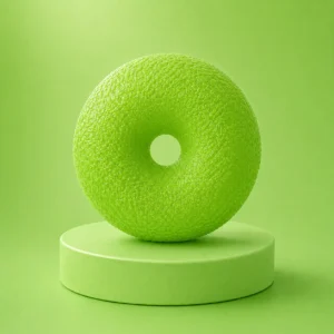The kiedle donut squishy stress ball in green over a green background